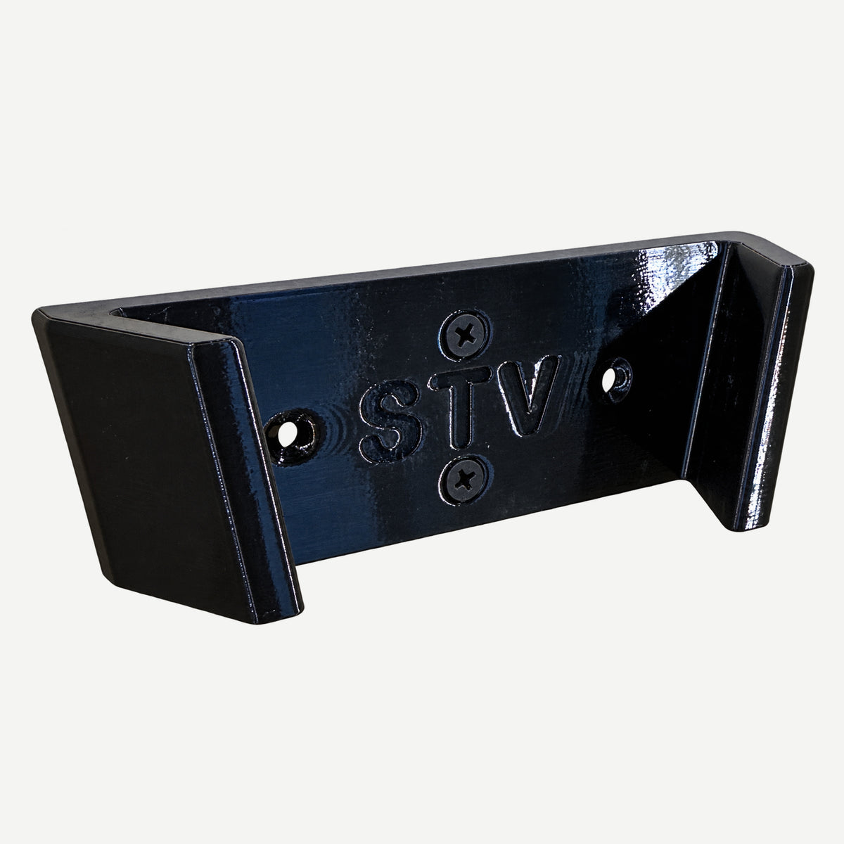 Black M18 Blower Mount with recessed STV lettering and dovetail retaining lips, isolated on a clean background.