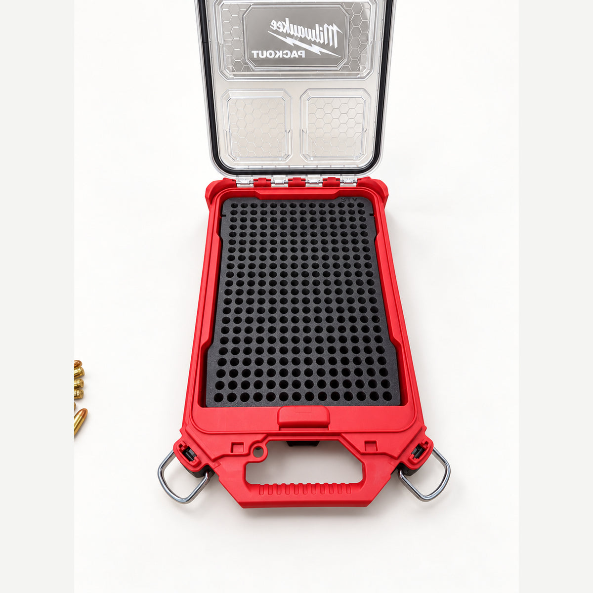 Top view of an empty RangeRack 9mm Ammo insert inside a red PACKOUT Slim Compact Organizer.
