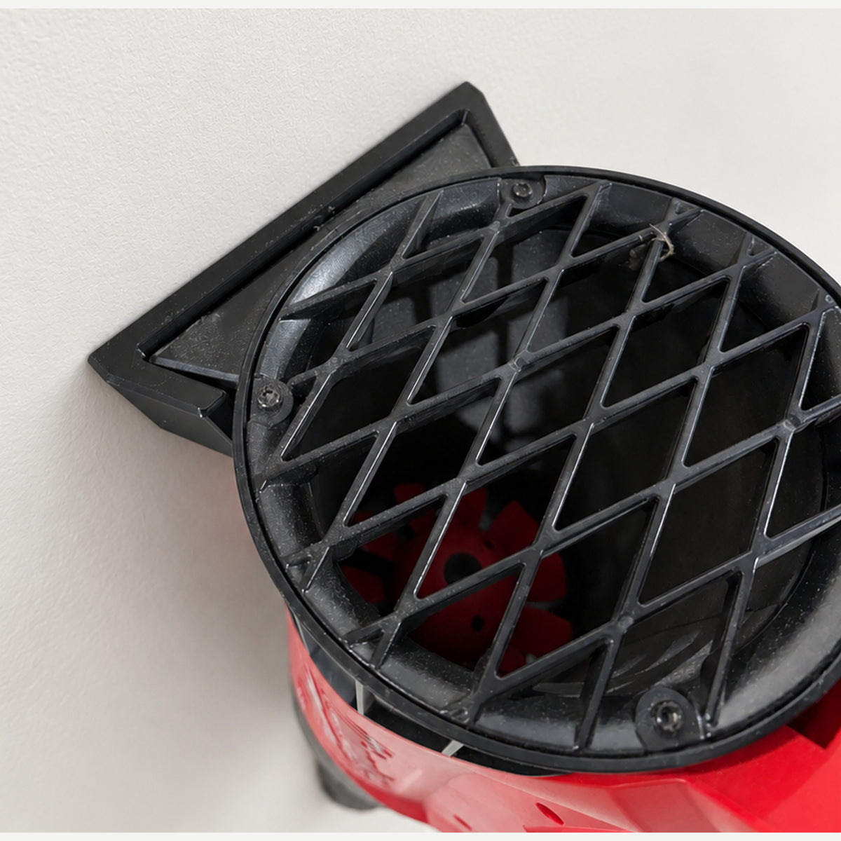 View from above showing the M18 Blower Mount dovetail fit at the Milwaukee blower intake housing.