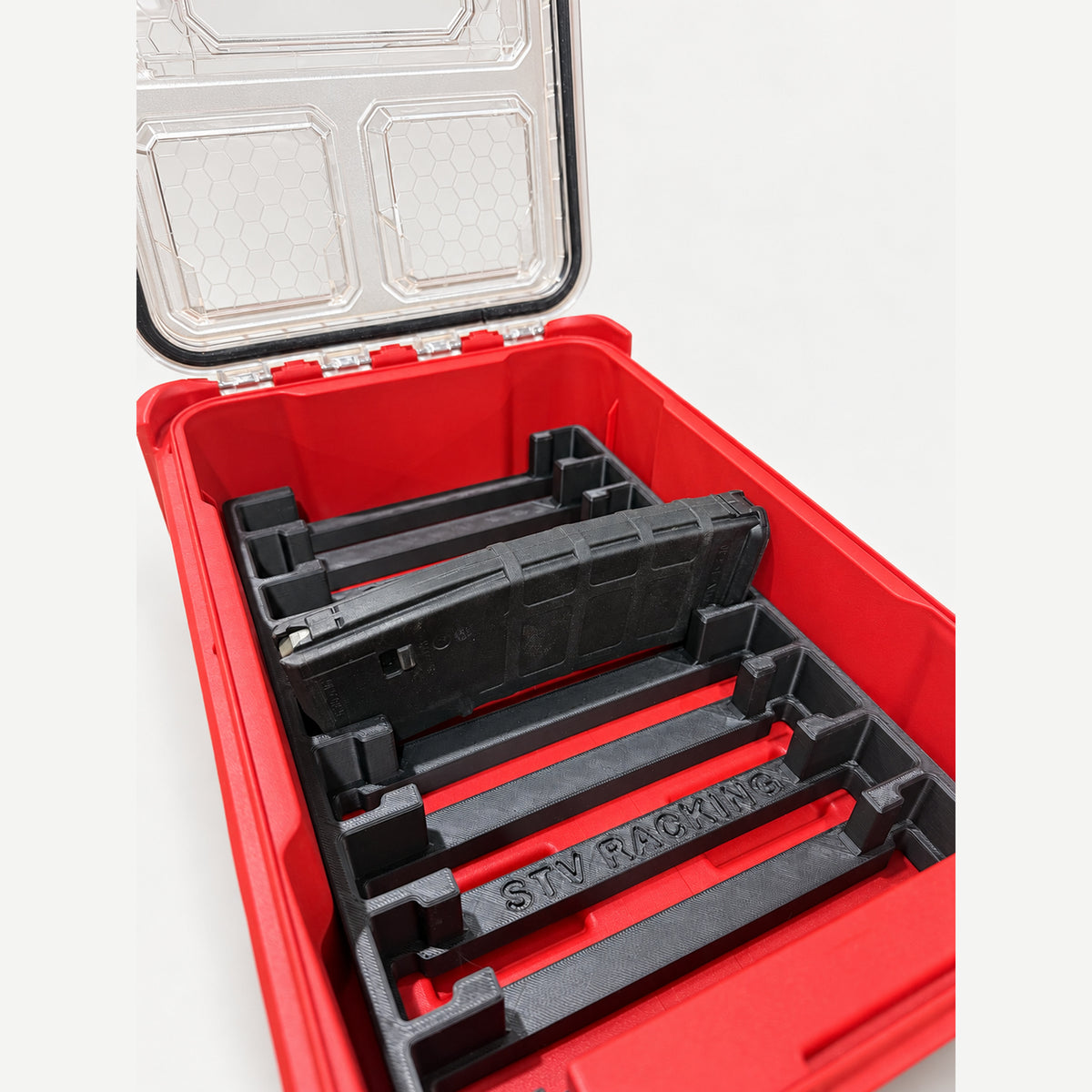 Close-up of a PMAG seated in the RangeRack AR15 insert with STV Racking lettering.
